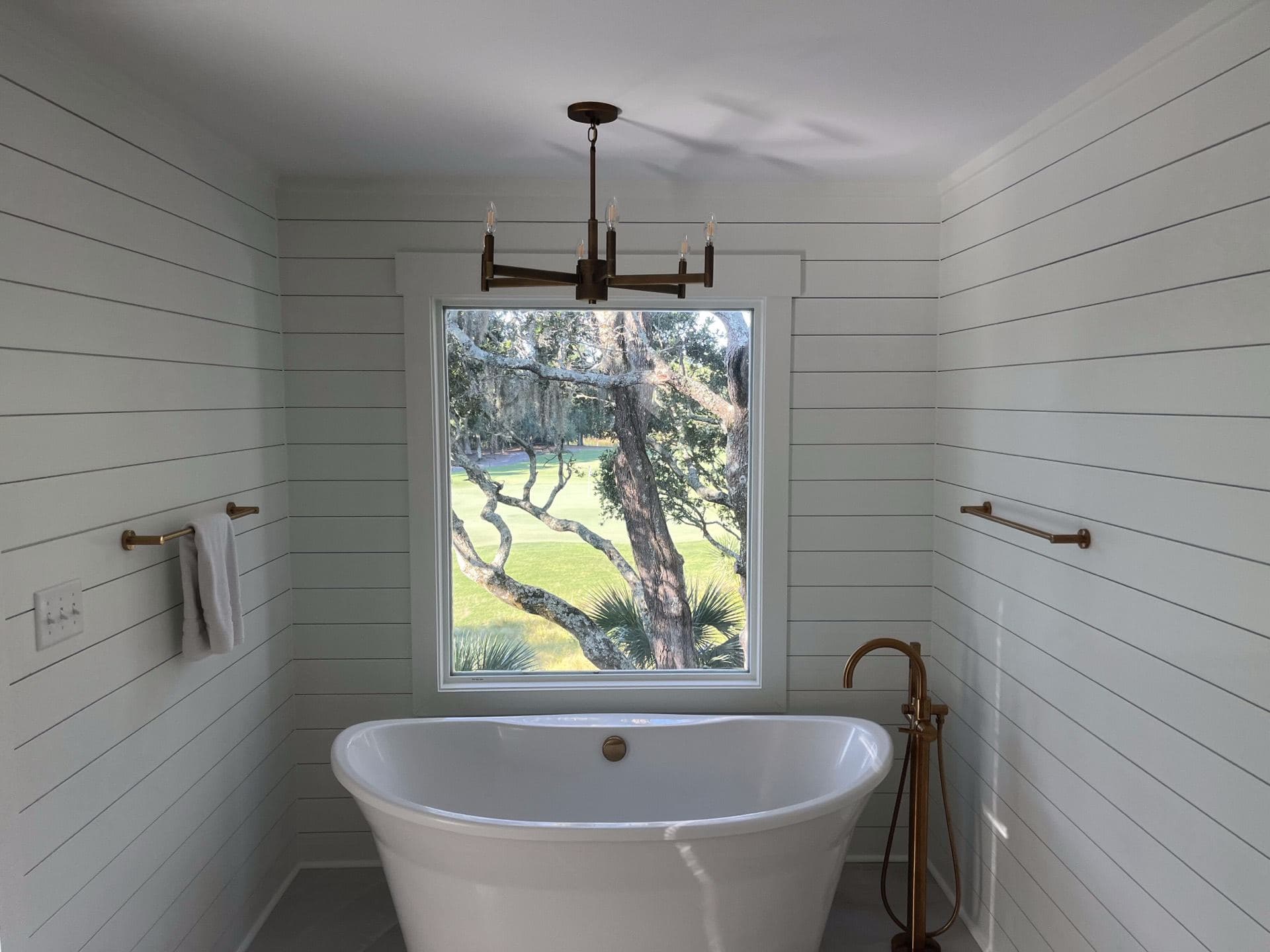 Freestanding tub remodel with Bald Head Island views by Project Works